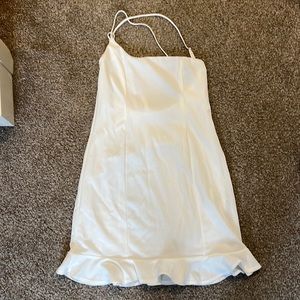 Shoulder ruffle white dress